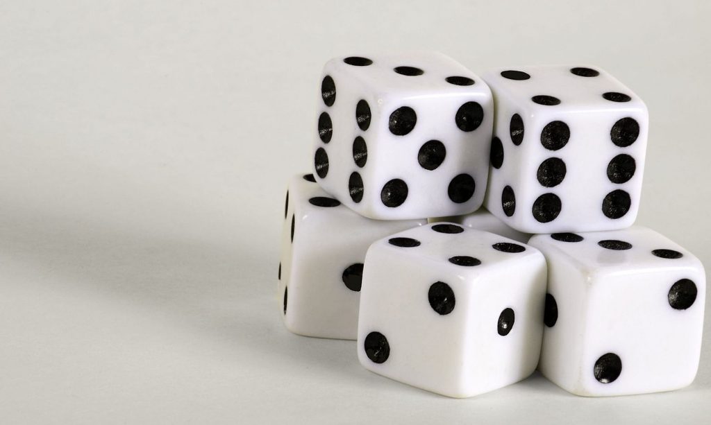 White dices on the white table